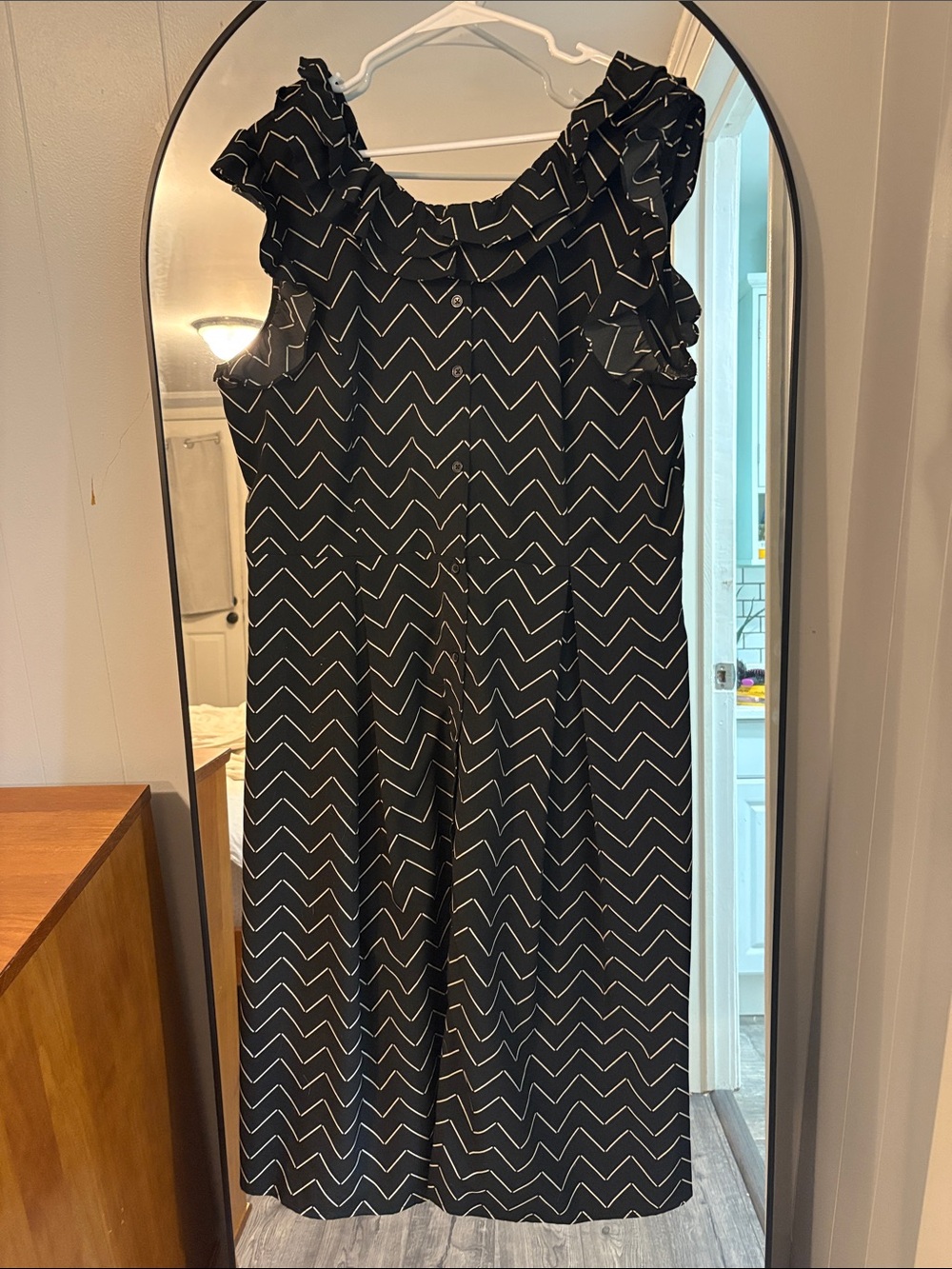 Black Chevron Wide-Leg Jumpsuit with Ruffle Neck